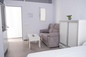 Estudio moderno céntrico para familias y parejas